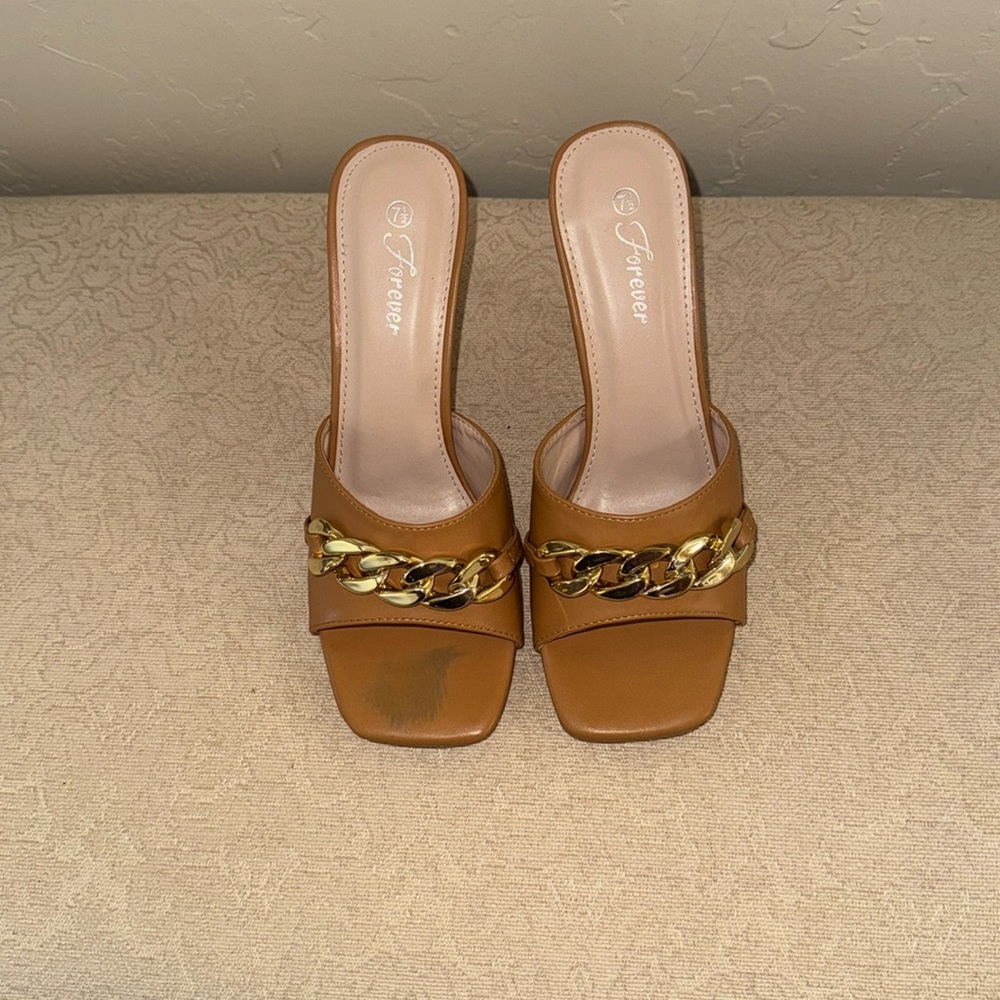 Cute brown high heels with chain on top